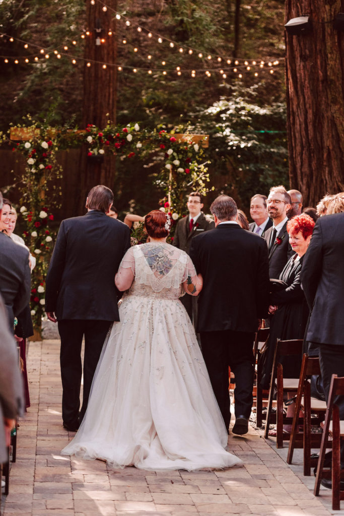 bride escorted down aisle with her father at Deer Park Villa