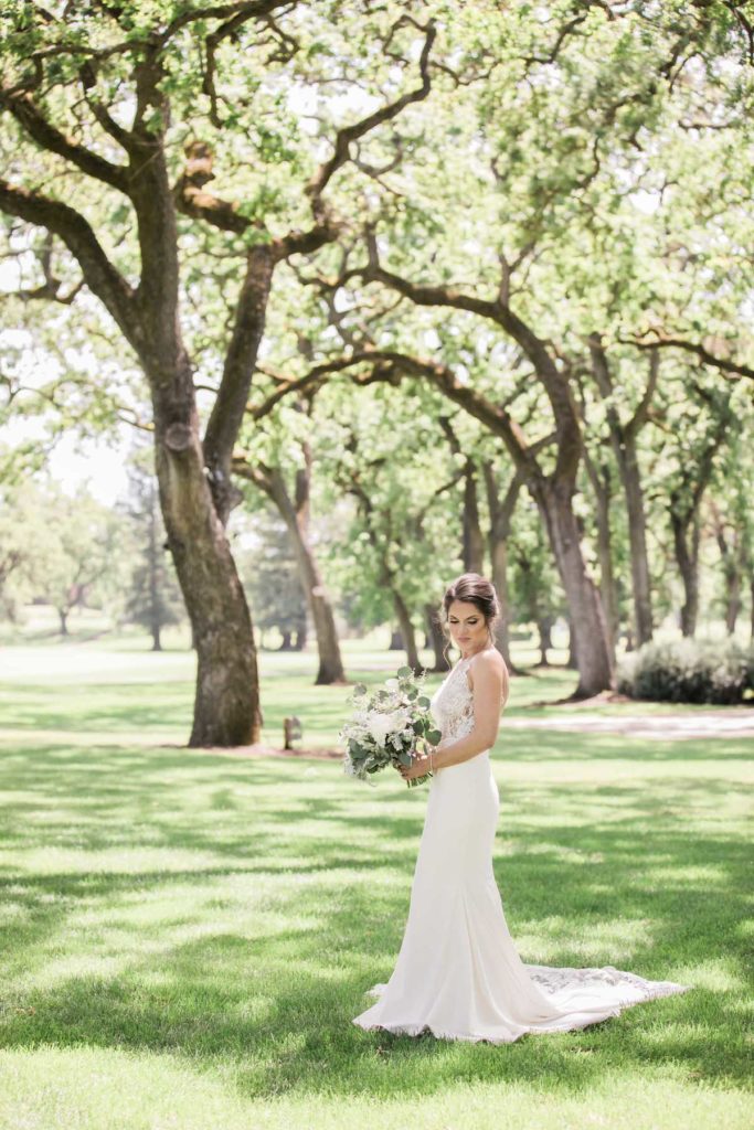 Bridal portrait under oak trees