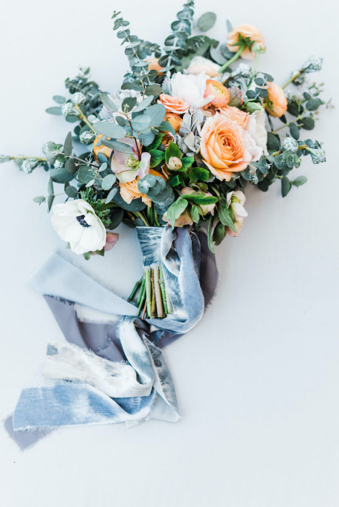peach and white bridal bouquet with velvet ribbon
