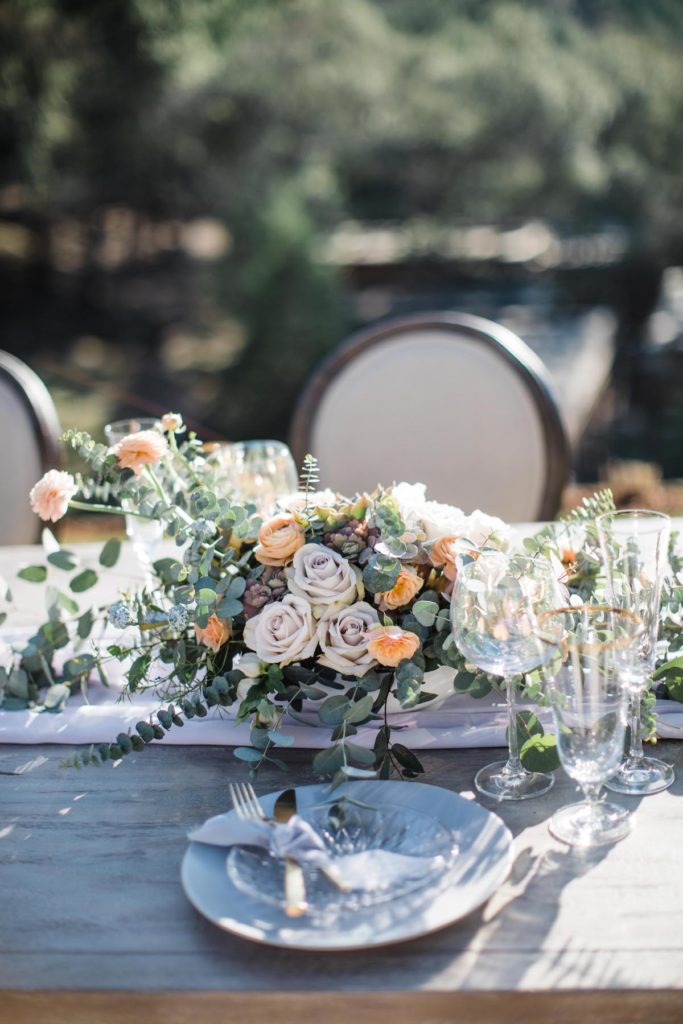 Tablescape decor with pastel flower centerpiece at Calistoga Ranch